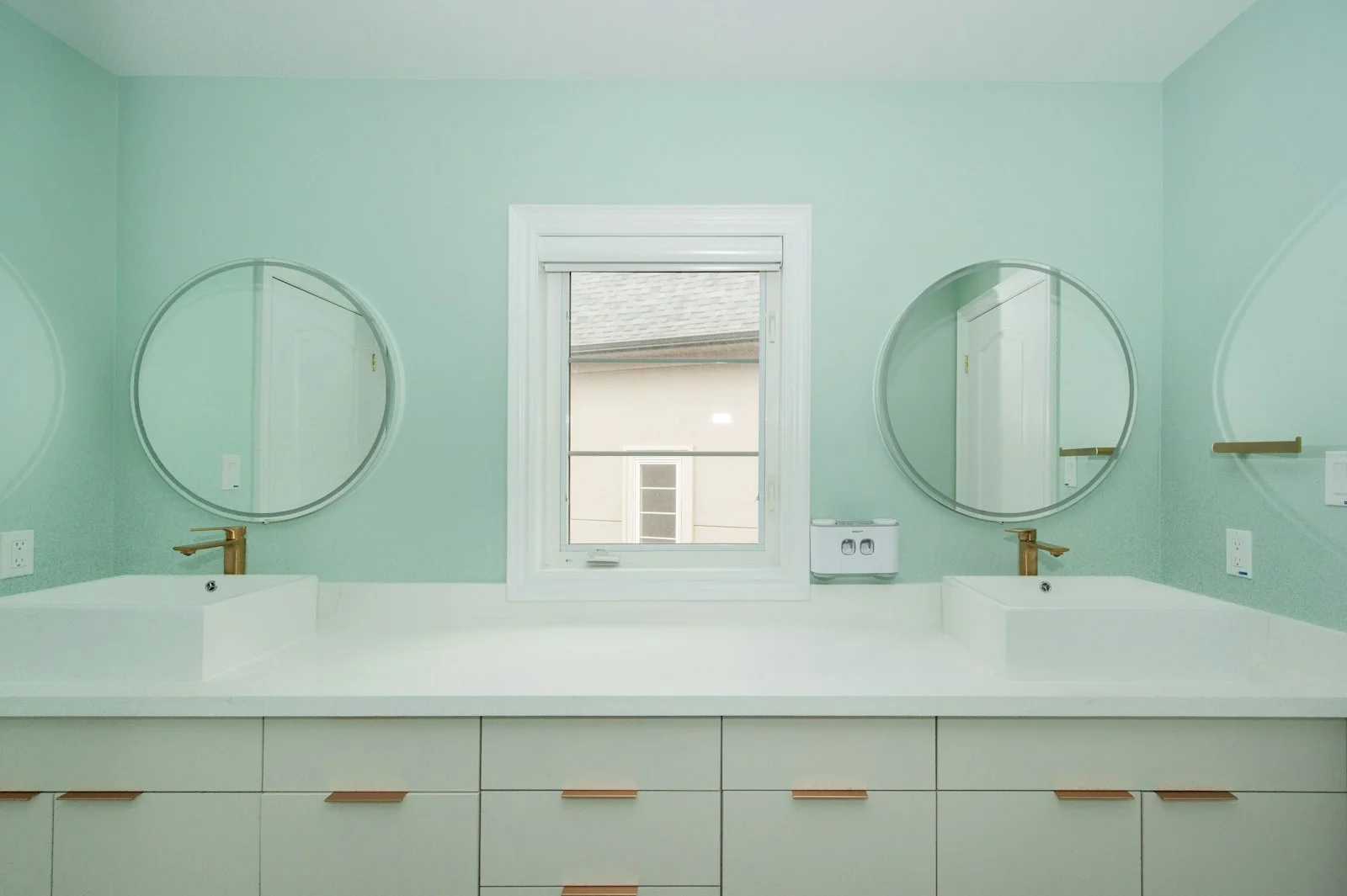 Modern bathroom with neutral tile, walk-in shower and floating vanity