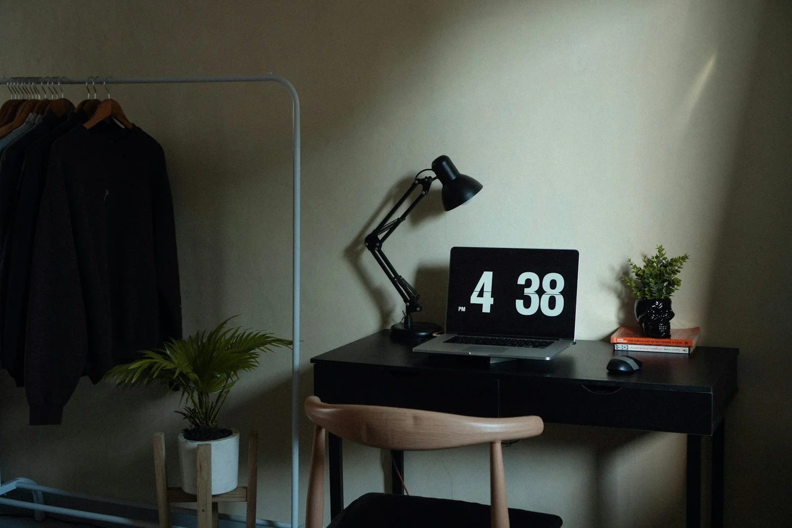 Productive home office with wood slat wall, vinyl plank floor and ergonomic desk